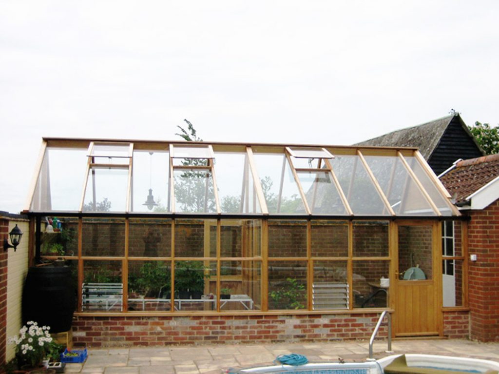 Timber Framed Glass Green House Construction