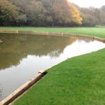 landscaping with revetments and timber bridge
